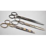 A Collection of Three Pairs of Swedish Enamelled Scissors, The Blades Decorated with Figures and