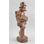 A Carved Wooden Spanish Study of a Bearded Gent with Basket and Grape Bin on Back, 40cm high