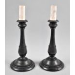 A Pair of Vintage Weighted Ebony Table Lamps in the form of Candle Sticks, 30cm high