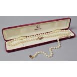 A Suite of Faux Jersey Pearls to Comprise Bracelet and Necklace
