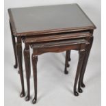 A Nest of Three Mahogany Tables, The Largest 54cms Wide
