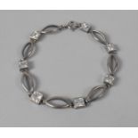 A Silver Bracelet Stamped 925 with Bright Cut Stones, 19cms Long