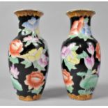 A Pair of Chinese Floral Decorated Vases, 21cms High