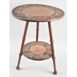 An Edwardian Circular Two Tier Tripod Table with Carved Bordered Top and Stretcher Shelf, 38.5cms