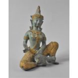 A Modern Thai Bronze Study of Seated Figure with Over Turned Vase, 14.5cms high
