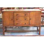 A Mid 20th Century Oak Sideboard, Having Three Central Drawers Flanked by Cupboards, 148cms Wide