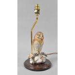 A Modern Resin Table Lamp with Owl Mount on Mahogany PLinth, 35cms Overall