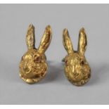 A Pair of Gilt Metal Novelty Cape Clips in the Form of Rabbits Heads with Red Jewelled Eyes