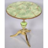 A Mid 20th Century Brass and Onyx Circular Tripod Table, 49cms Diameter