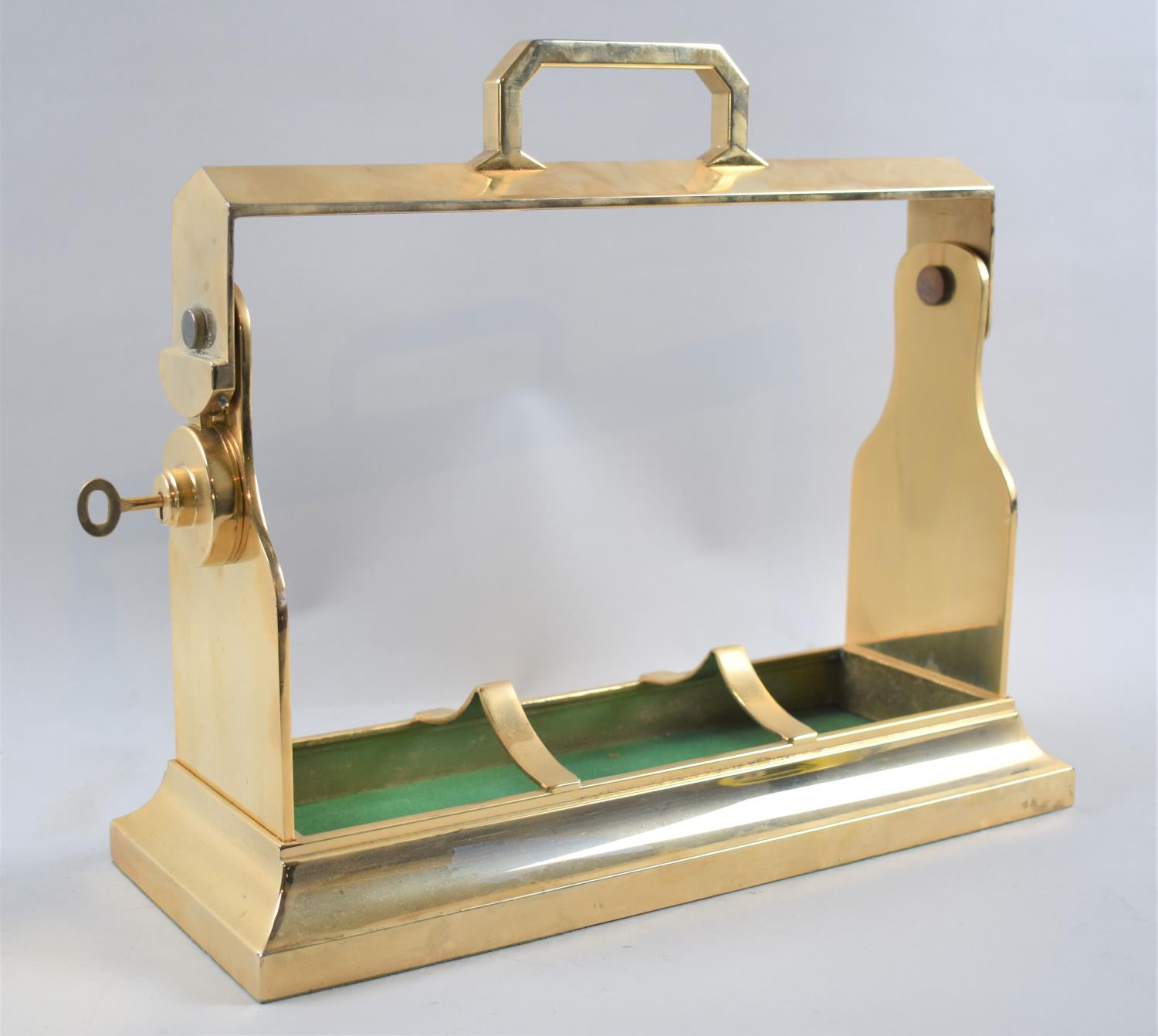 A Modern Brass Three Bottle Tantalus Frame, with Key, 34cms Wide