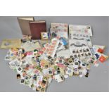 A Collection of Various Loose Stamps, Stock Books Etc