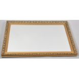 A Large Gilt Framed Rectangular Wall Mirror, 92x61cms