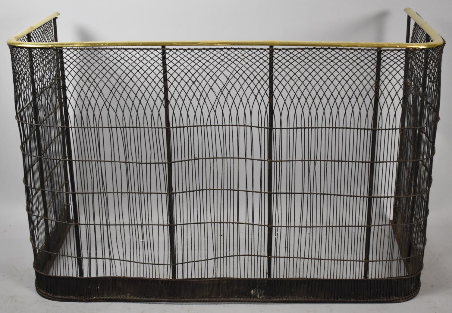 A Late Victorian/Edwardian Wire and Brass Mounted Nursery Fire Guard, 95cm Wide