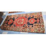 An antique Persian Hand Made Kurdish Rug, 210x104cms