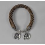 A Victorian Braided Hair Bracelet with Silver Horseshoe Mount