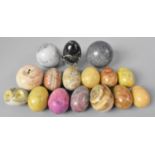 A Collection of Various Polished Stone Eggs, Balls and Fruit