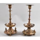 A Pair of Late 19th century Russian Bronze Candlesticks on Circular Bases, Stamped and Dated 1882,