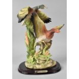 A Large Juliana Collection Study of Mallard Ducks in Flight on Mahogany PLinth, 34cms High