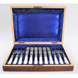 An Edwardian Mahogany Cased Canteen of Six Mother of Pearl Handled Fish Knives and Forks with Etched