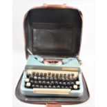 A Vintage Leather Cased Portable Manual Typewriter