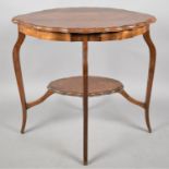 An Edwardian Mahogany Oval Topped Occasional Table, 74cms Wide