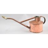 A Long Spouted Circular Copper Watering Can, 13.5cms Long