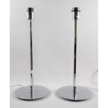 A Pair of Modern Chromed Hilton Hotel Table Lamps on Circular Bases, 56cms High