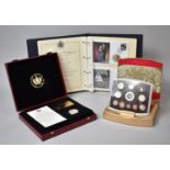 A Ring Binder Containing Royal Commemorative First Day Coin Covers, a Boxed Set of Golden Jubilee