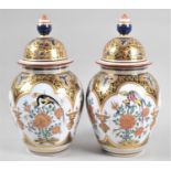 A Pair of Modern Oriental Gilt and Floral decorated Lidded Vases, Each 29cm high