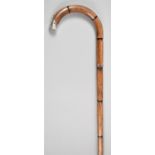 A Silver Mounted Faux Bamboo Walking Stick, 92cm Long