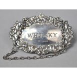 A Silver Decanter Label for Whisky, by D J S London 1968