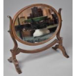 An Edwardian Mahogany Framed Oval Dressing Table Swing Mirror, 41.5cm wide