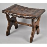 A Mid 20th Century Leather Topped Stool on Refectory Base, 50cm x 36cm x 39cm high
