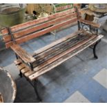 A Wooden Garden Bench with Cast Iron End Panels, 117cm Long