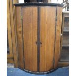 A Late 19th Century Bow Fronted Corner Cabinet, 67cm wide