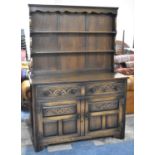 A Mid 20th Century Oak Dresser, the Base with Two Drawers Over Cupboard, Two Shelf Plate Rack, 123cm