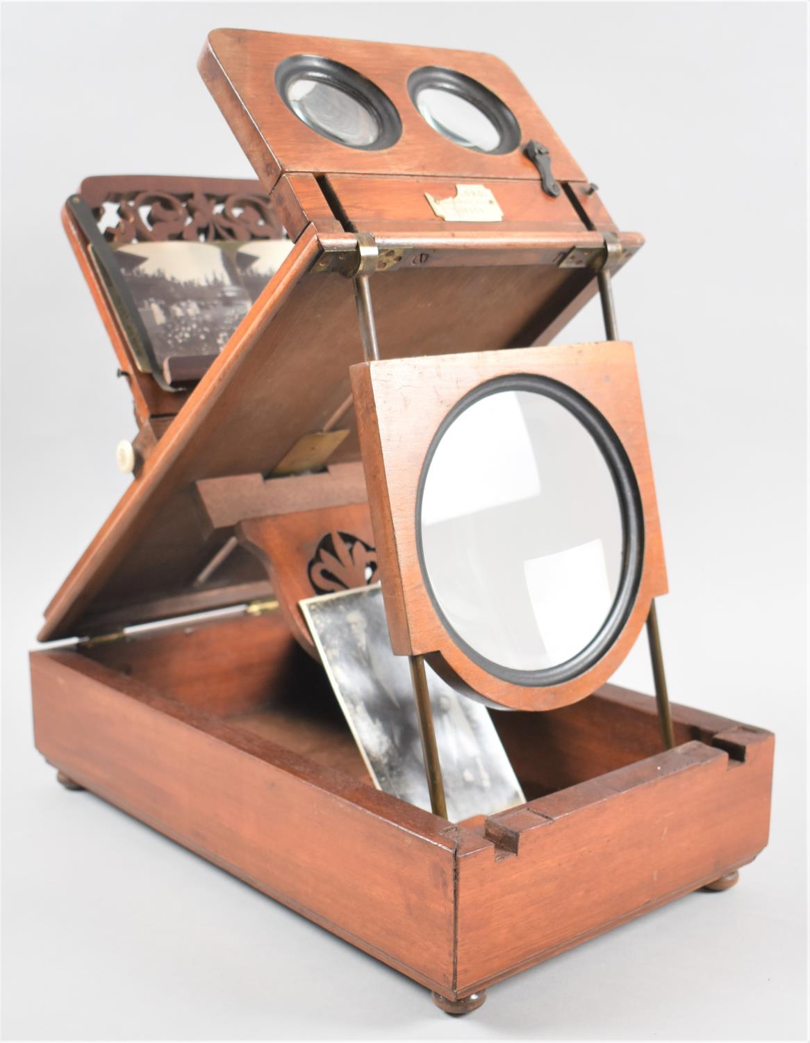 A Late Victorian Mahogany Table Top Stereoscopic Slide and Postcard Viewer by Dollond, Ludgate Hill,