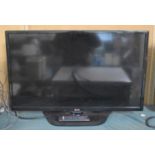 A Flat Screen 31" LG TV with Remote
