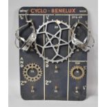 A Vintage Wall Hanging Cyclo-Benelux Bicycle Parts Rack with Gears and Pedals