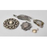 A Collection of Late 19th/Early 20th Century Silver and White Metal Buckle and Brooches to Include