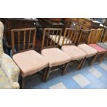 A Set of Four Upholstered Dining Chairs