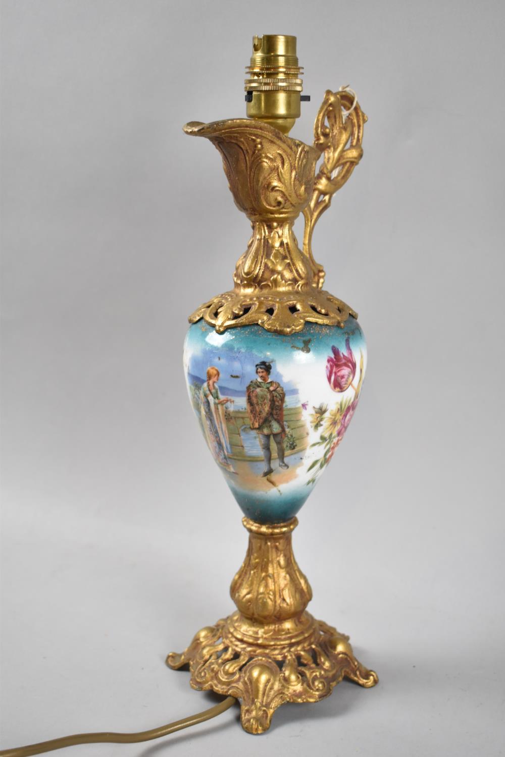 A Novelty Continental Table Lamp Base in the Form of a Gilt and Porcelain Claret Jug Decorated