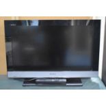 A Sony Bravia 26" TV with Remote