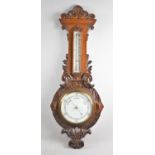 A Late Victorian Oak Framed Wheel Barometer with Thermometer, Carved Decoration, 93cm high