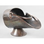 A Victorian Copper Helmet Shaped Coal Scuttle
