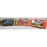 Three Boxed Burago Diecast Cars, Aston Martin, Lamborghini and BMW