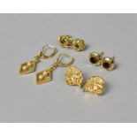 A Collection of Yellow Metal Earrings to Include Filigree, Knot and Garnet Mounted Examples