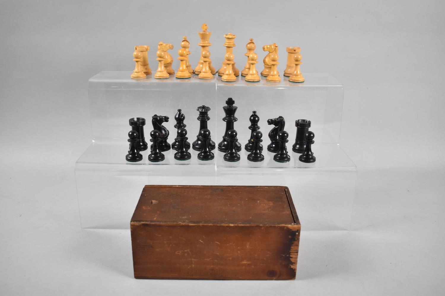 An Edwardian Stained Box Containing Staunton Style Chess Pieces, The Kings 8.5cm high