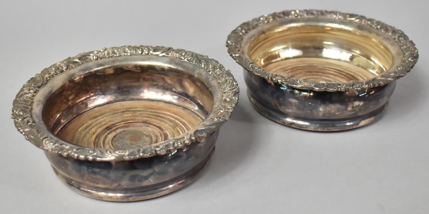 A Pair of Sheffield Plated Bottle Coasters, Each 15cms Diameter