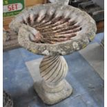 A Reconstituted Stone Garden Bird Bath in the Form of a Shell, 70cm high